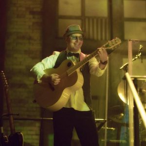 Jake Morelli with guitar